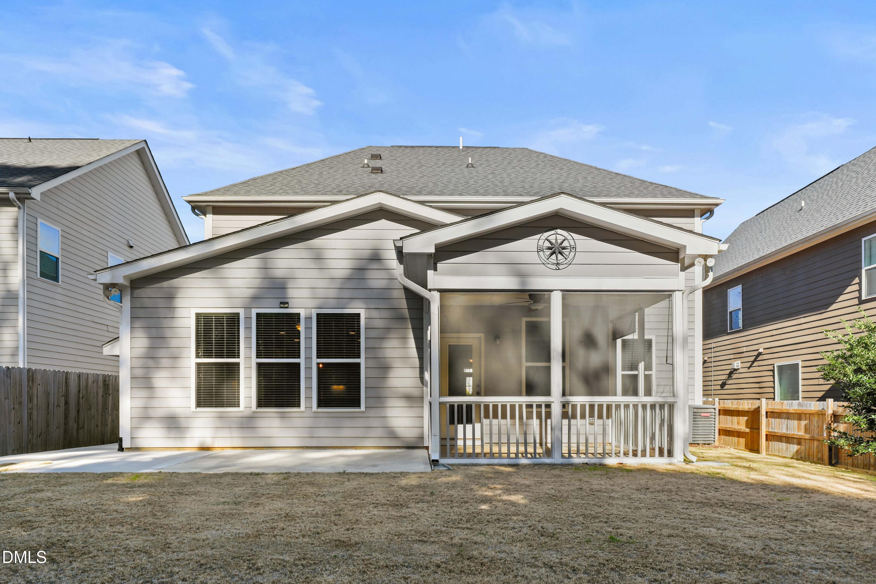 2039 Travern Drive Raleigh, NC 27603 - Photo 47 of 49 a front view of a house with a garden