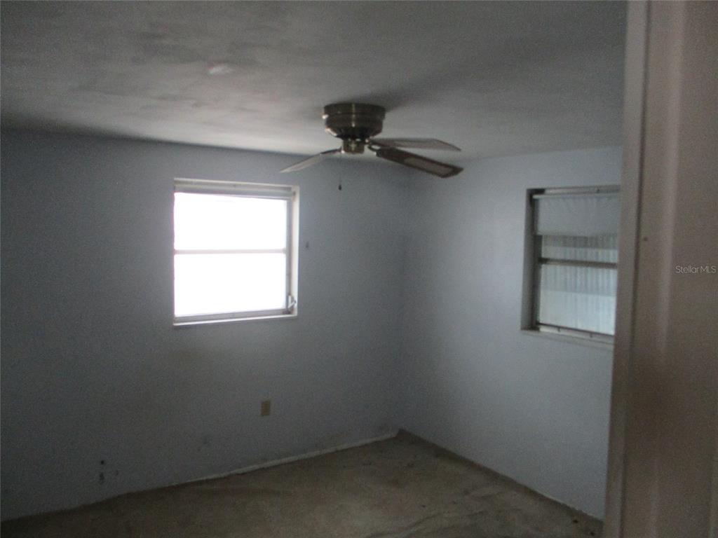 7403 Heather Street New Port Richey, FL 34653 - Photo 15 of 16 an empty room with a window