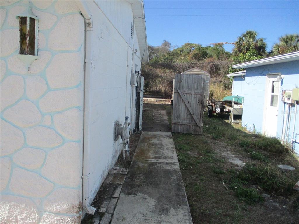 7403 Heather Street New Port Richey, FL 34653 - Photo 3 of 16 a view of a back yard
