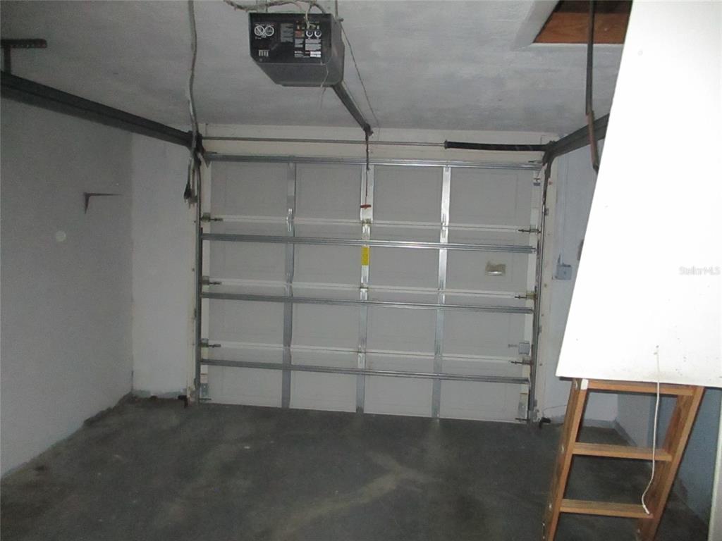 7403 Heather Street New Port Richey, FL 34653 - Photo 8 of 16 a view of an empty walk in closet