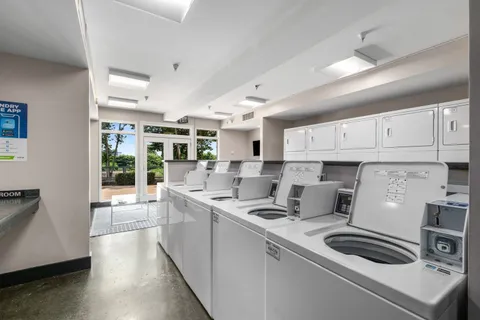 a view of a balcony with furniture