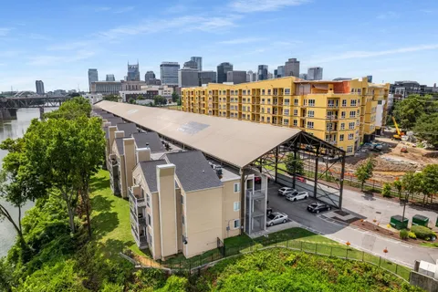 a view of a chairs and table in the patio