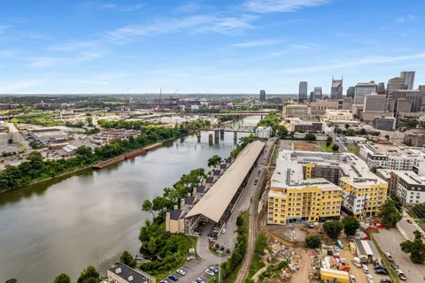a view of a building with a yard