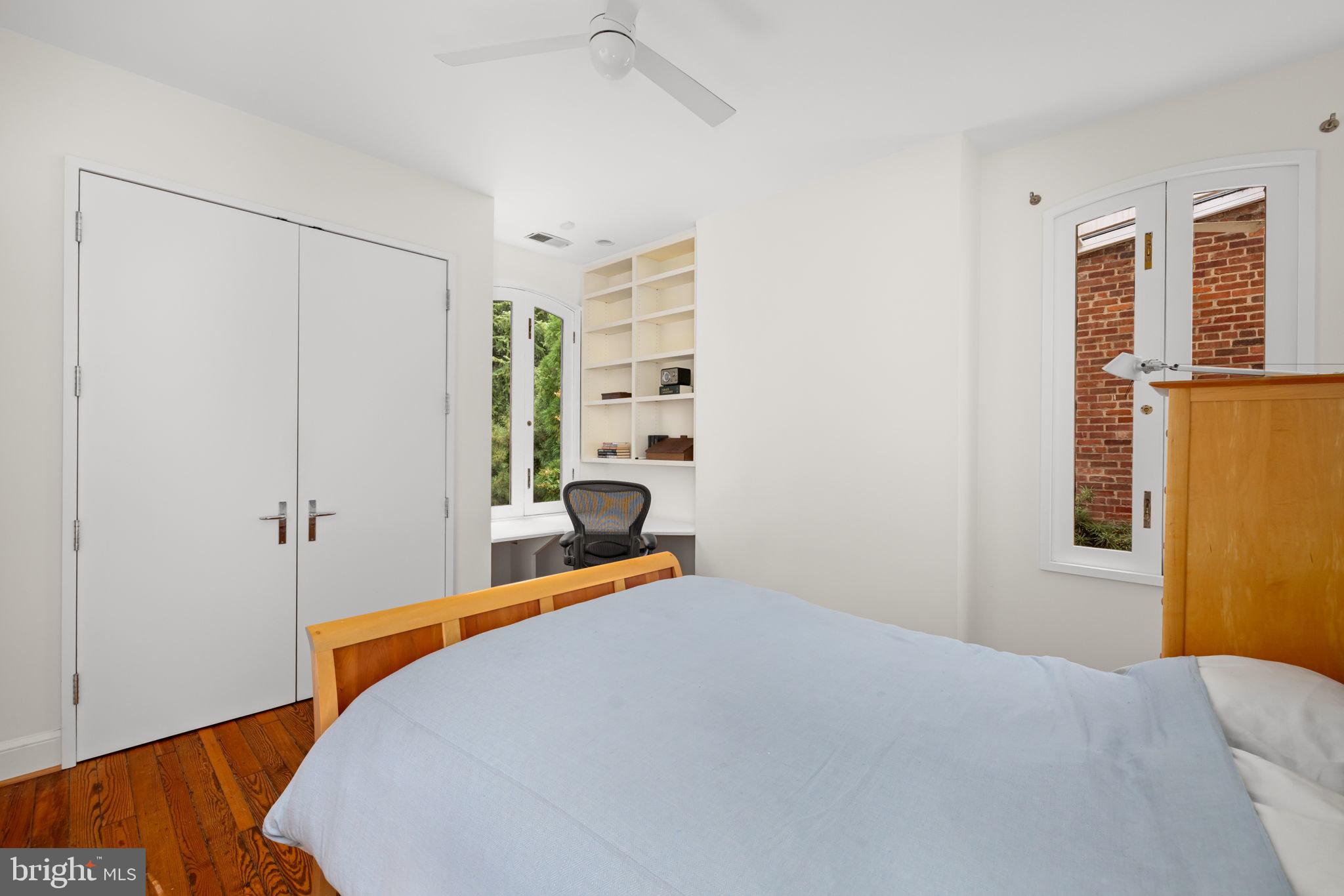 2813 Q Street Northwest Washington, DC 20007 - Photo 12 of 22 a bed room with a bed and a window