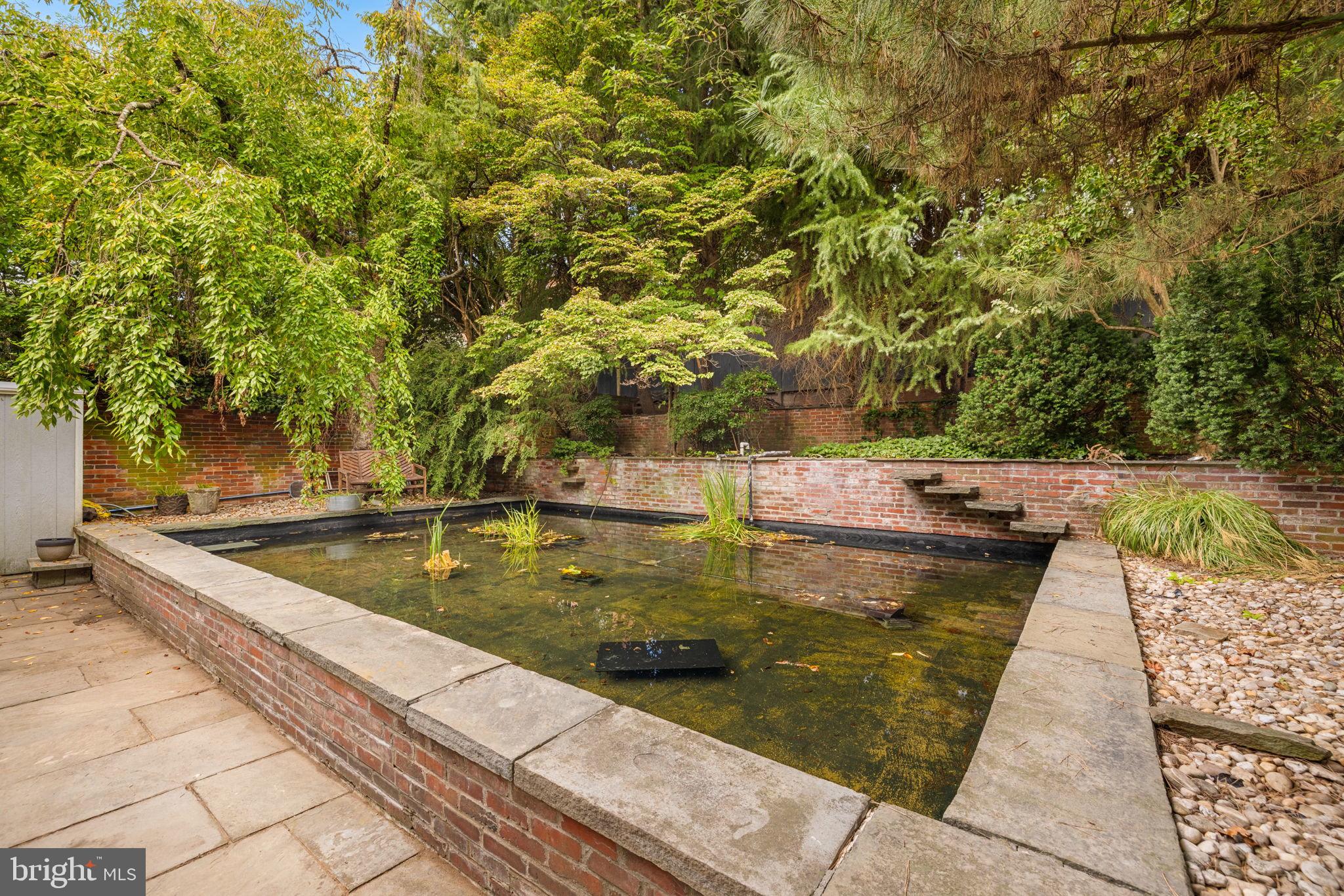 2813 Q Street Northwest Washington, DC 20007 - Photo 21 of 22 a view of a swimming pool with a yard