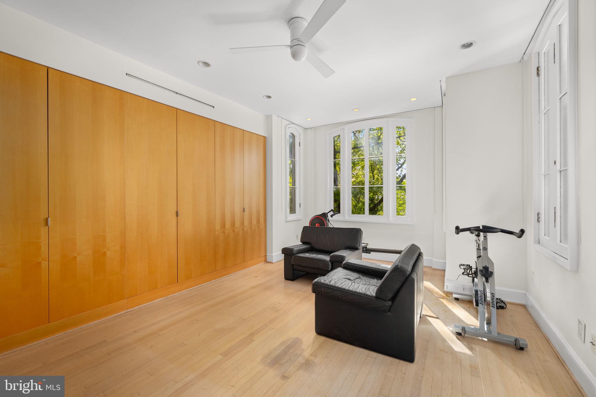 2813 Q Street Northwest Washington, DC 20007 - Photo 8 of 22 a living room with furniture and a window