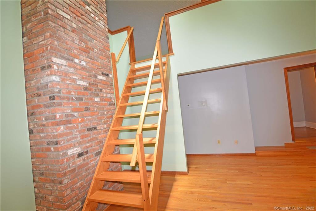 405 Maple Avenue Cheshire, CT 06410 - Photo 16 of 37 a view of a room with stairs