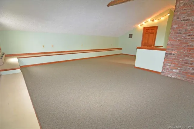 view of an empty room with a window