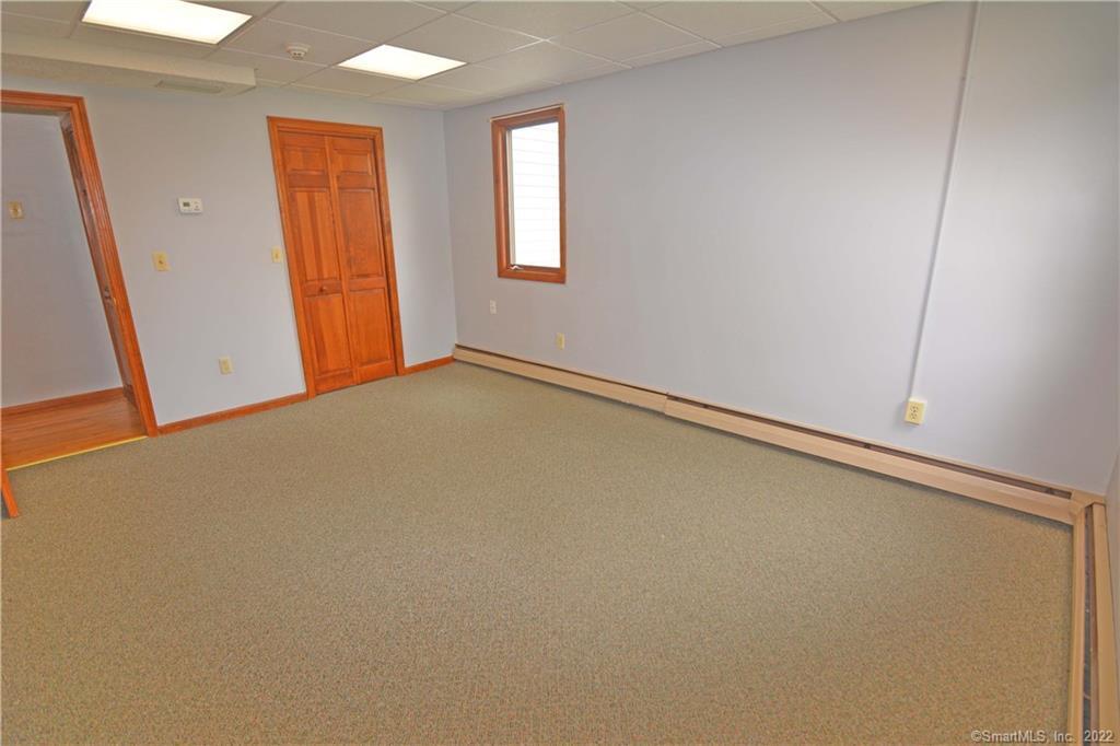 405 Maple Avenue Cheshire, CT 06410 - Photo 25 of 37 an empty room with window