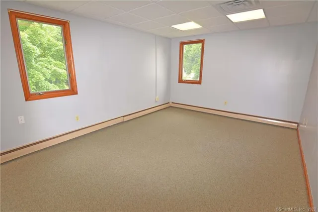 an empty room with windows