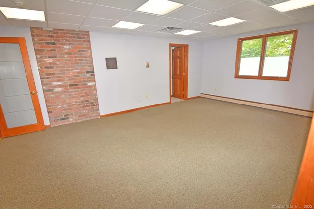 en empty room with windows