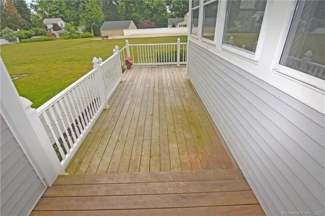 a view of deck with a ocean view