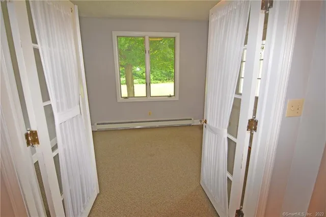 an empty room with windows