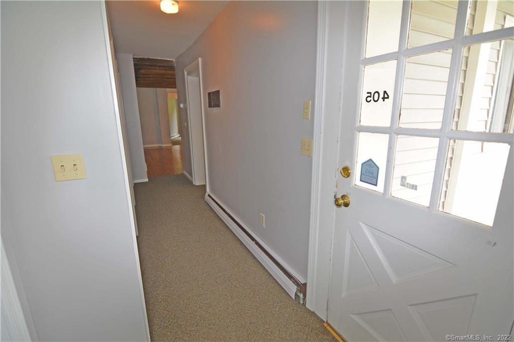 405 Maple Avenue Cheshire, CT 06410 - Photo 4 of 37 a view of hallway with windows