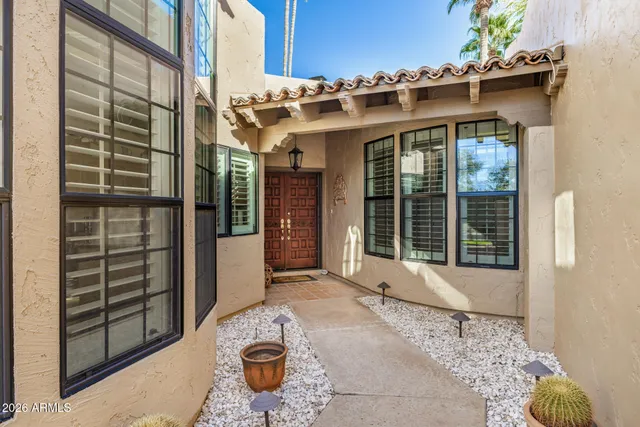 a view of a house with a large window