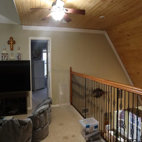 a view of a porch with wooden floor