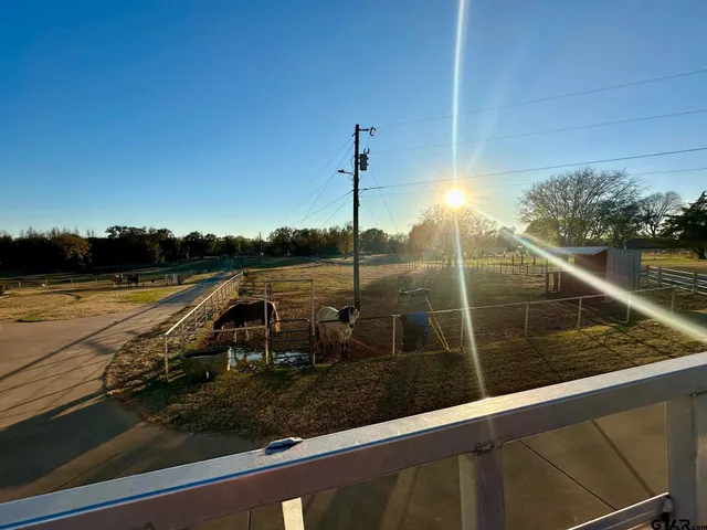 a view of a wooden terrace with a sitting area