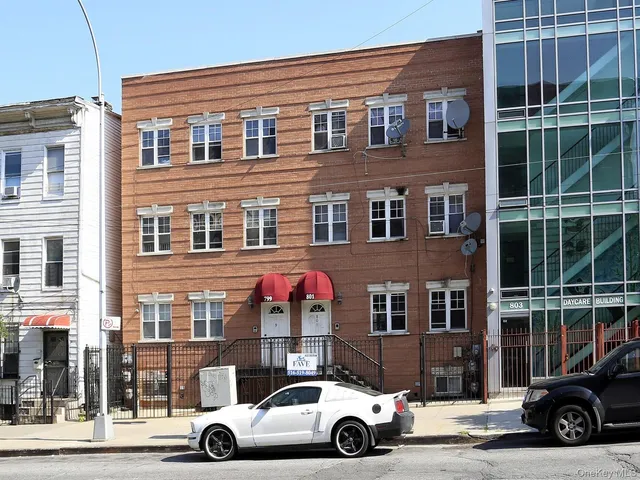 a car parked in front of a building