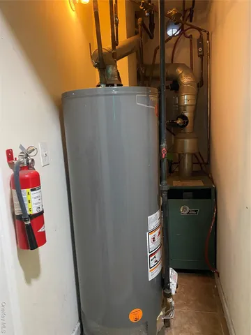 a kitchen with a refrigerator and a sink