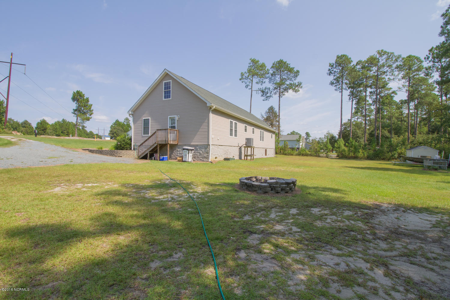 724 Ridgecrest Lane Rocky Point, NC 28457 - Photo 19 of 21 724 Ridgecrest Ln-large-019-12-Rear Exte
