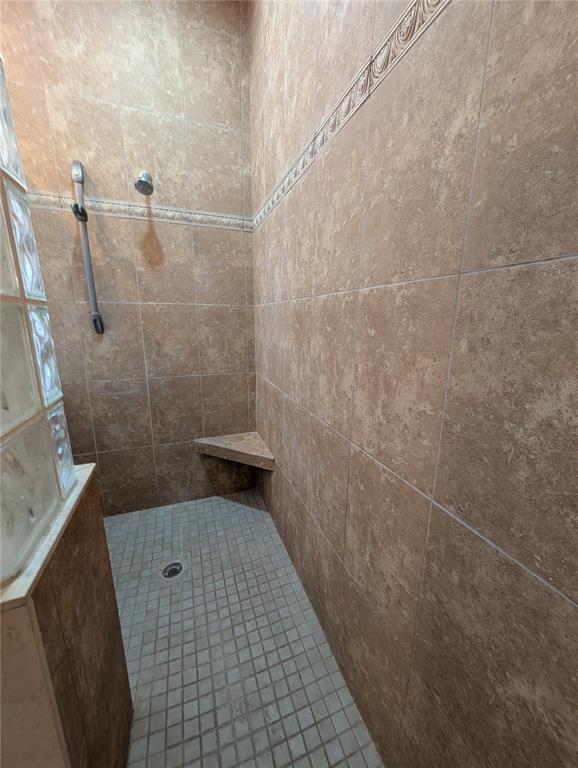 7436 Islander Lane Hudson, FL 34667 - Photo 22 of 27 a bathroom with a shower