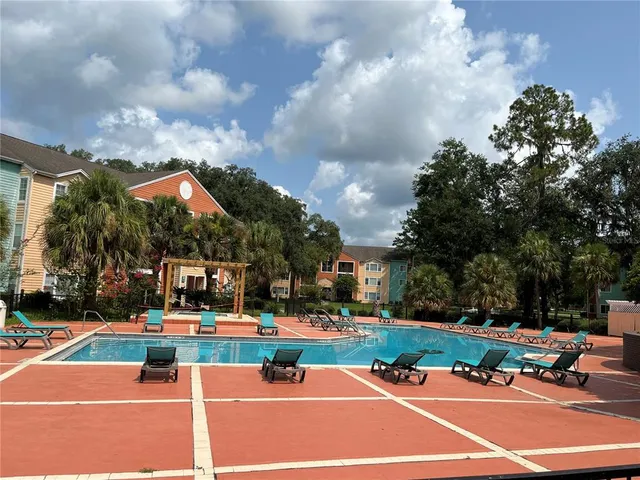a tennis court with view of street