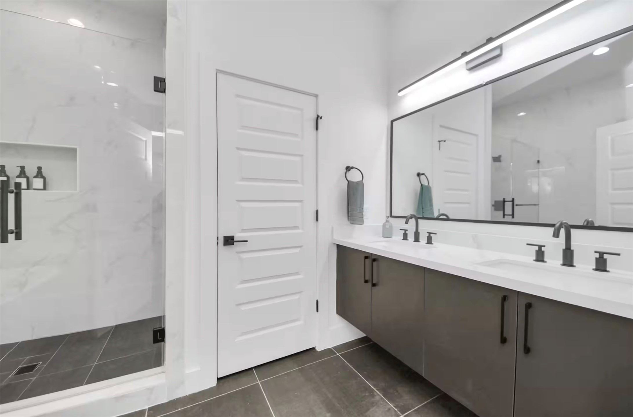 3521 Mainer Street Houston, TX 77021 - Photo 28 of 37 a bathroom with a double vanity sink a and mirror