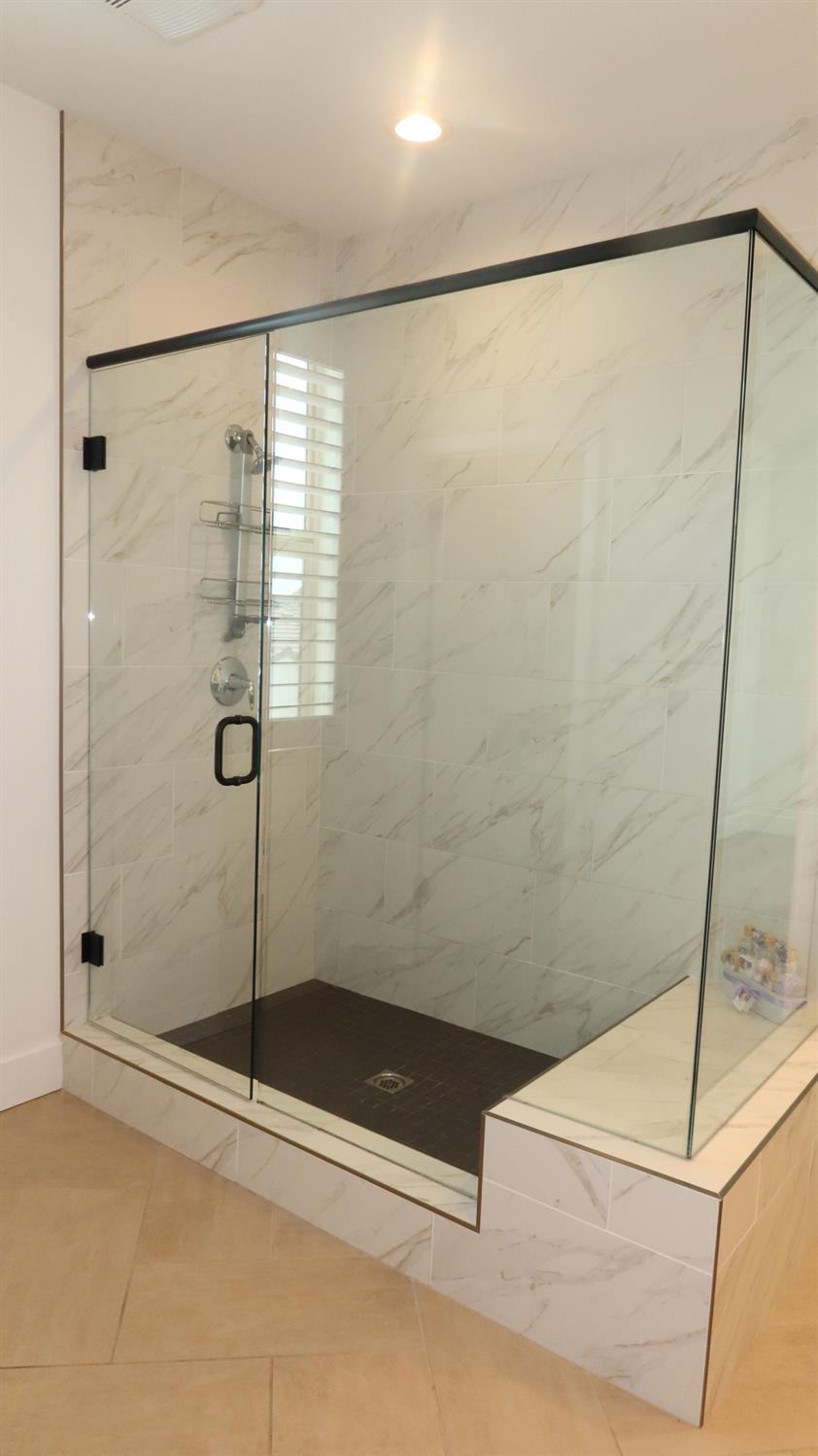 4254 Oak Knoll Road Madera, CA 93636 - Photo 28 of 74 a bathroom with a shower