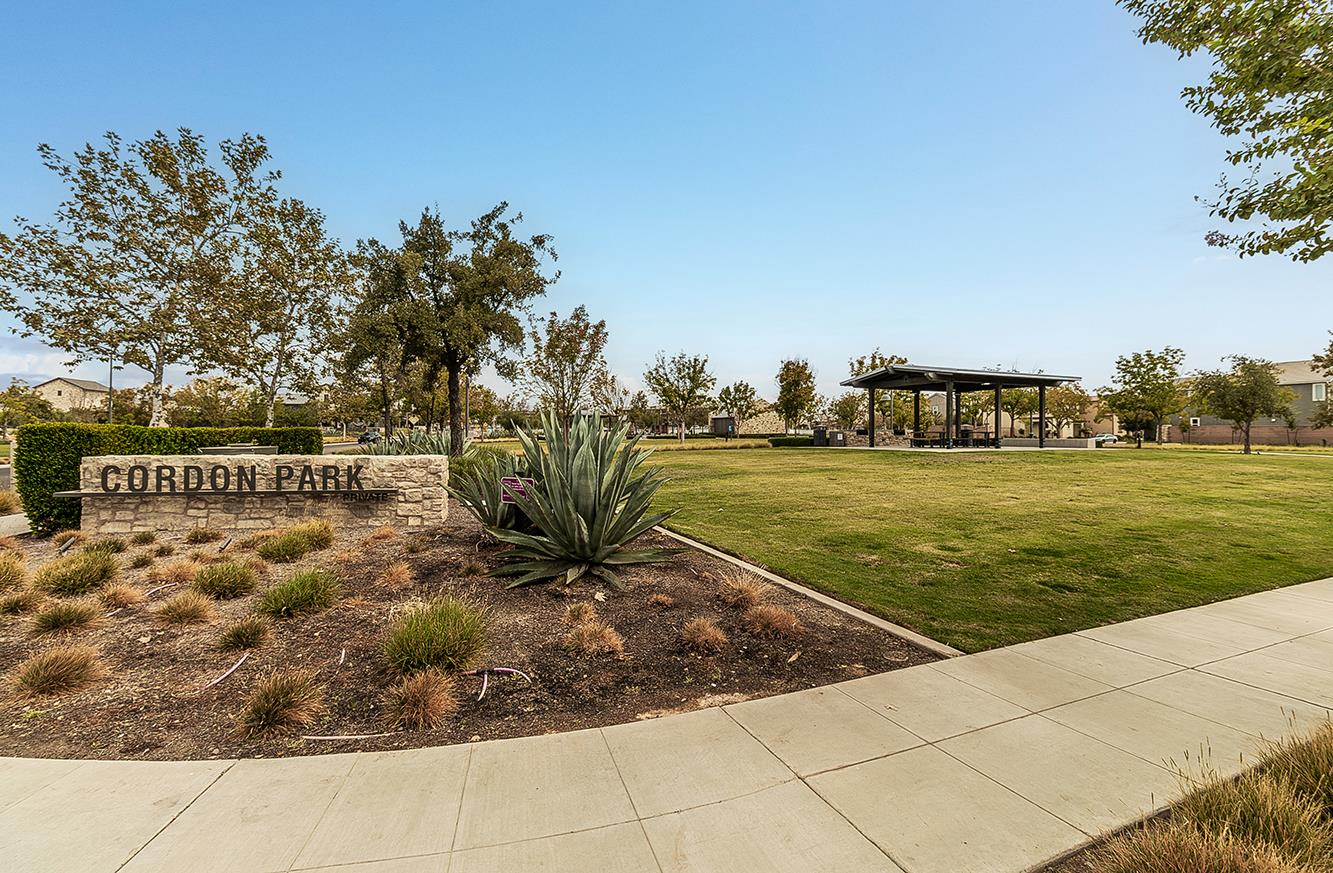4254 Oak Knoll Road Madera, CA 93636 - Photo 58 of 74 a view of a pathway both side of grassy field with shrub