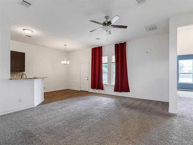 a view of a livingroom with a flat screen tv