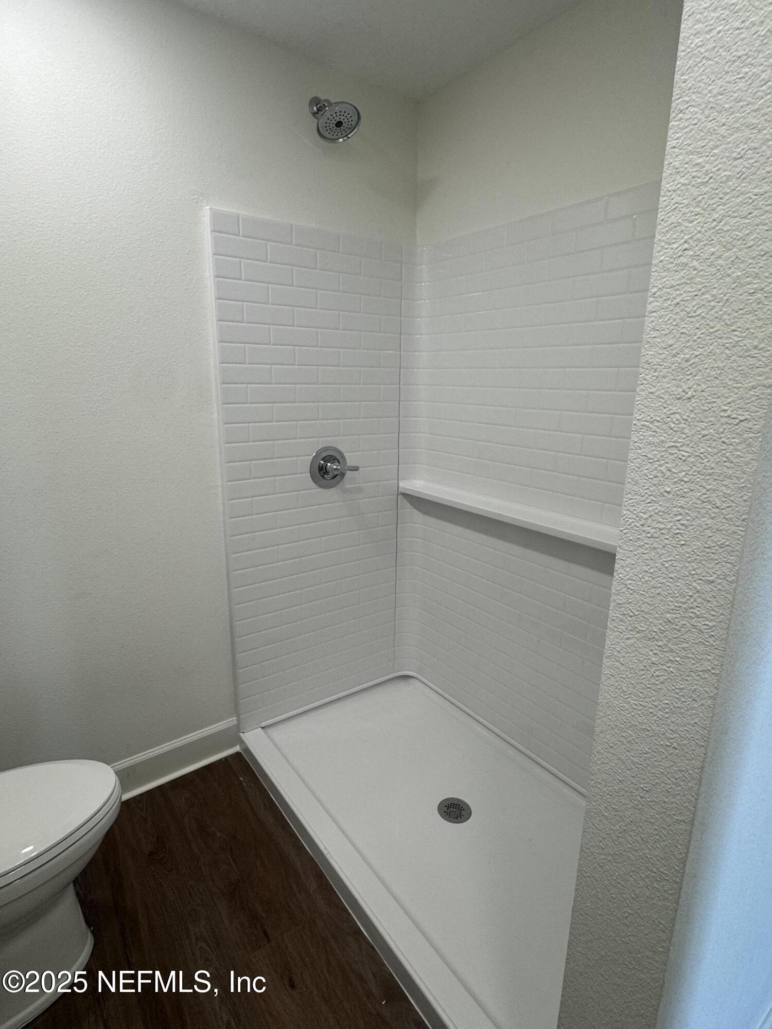 115 East Call Street Starke, FL 32091 - Photo 11 of 11 a bathroom with a sink and a toilet