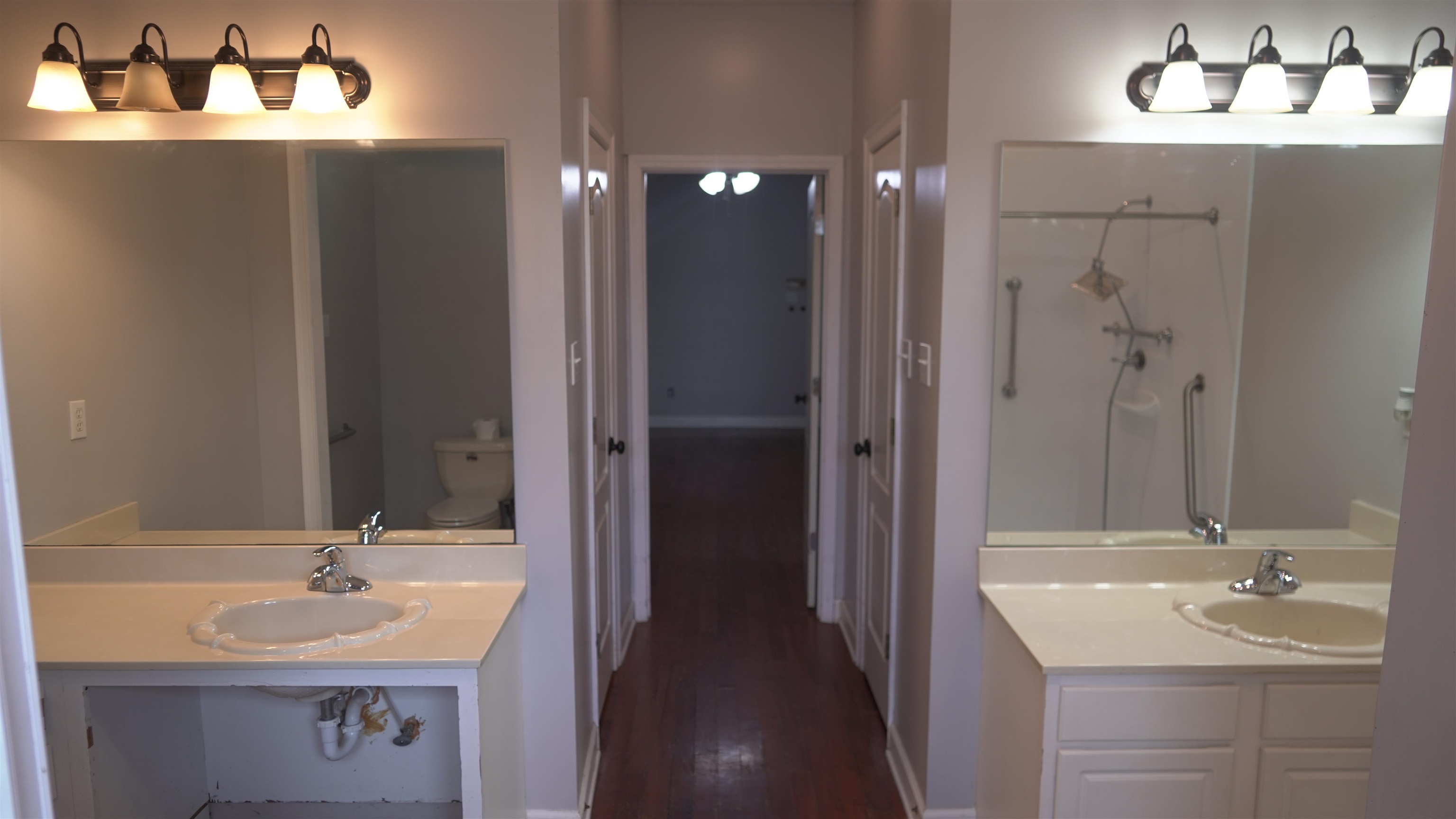 3717 Meade Lake Road Millington, TN 38053 - Photo 11 of 16 Full bathroom with vanity, a shower, and dark wood-type flooring