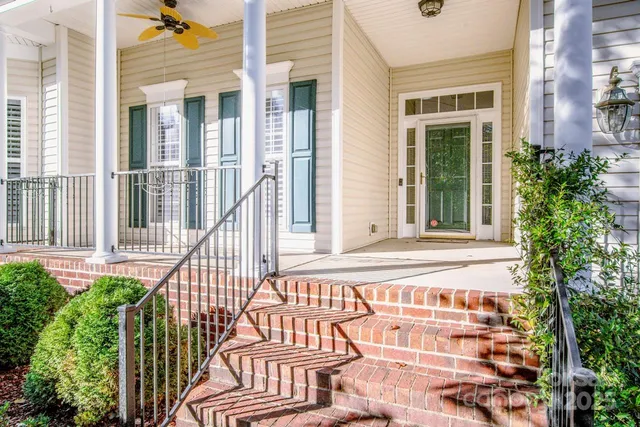 front view of a house with a large window