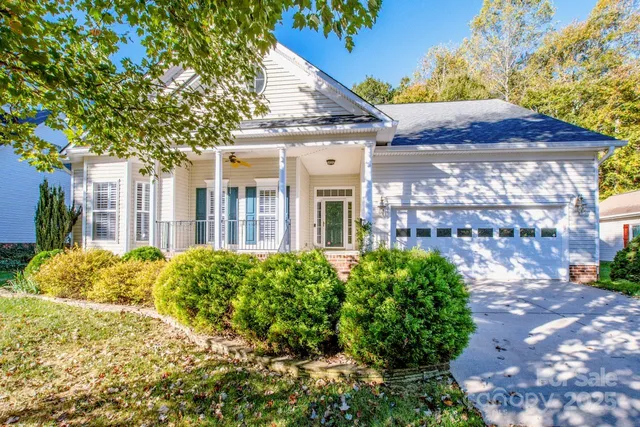 a view of a brick house with a large windows