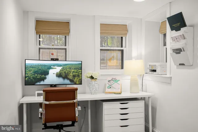 a room with furniture and a window