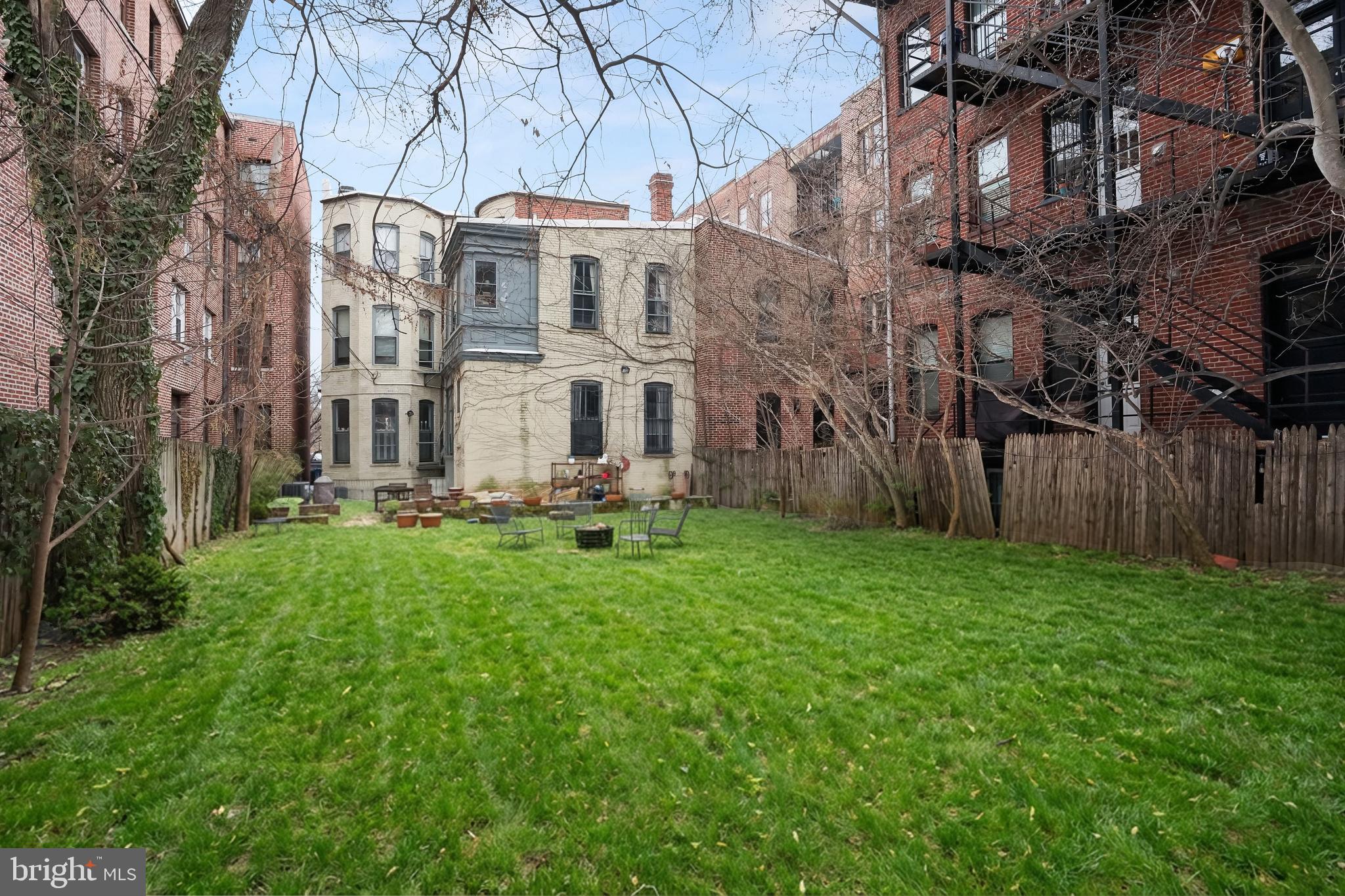 408 Seward Square Southeast, Unit 1 Washington, DC 20003 - Photo 20 of 21 a view of a building with a yard
