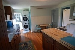 23 Everson Road, Unit 23 Marshfield, MA 02050 - Photo 5 of 6 a bathroom with a sink a toilet and a mirror
