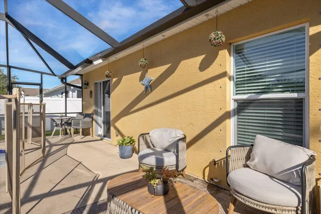 a view of a swimming pool with a patio