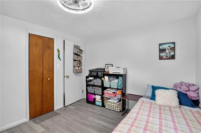 a view of a bedroom with baby bed