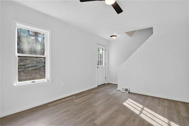 an empty room with windows