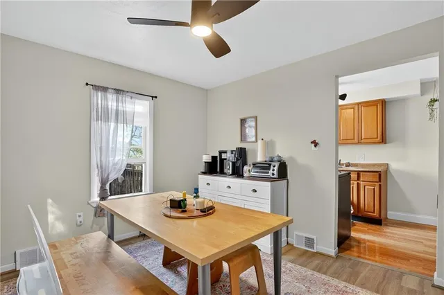a view of a dining room with furniture