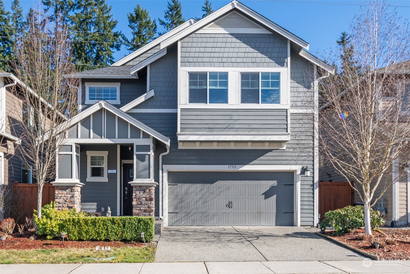 17315 42nd Avenue Southeast Bothell, WA 98012 - Photo 1 of 32 a view of a yard in front view of a house