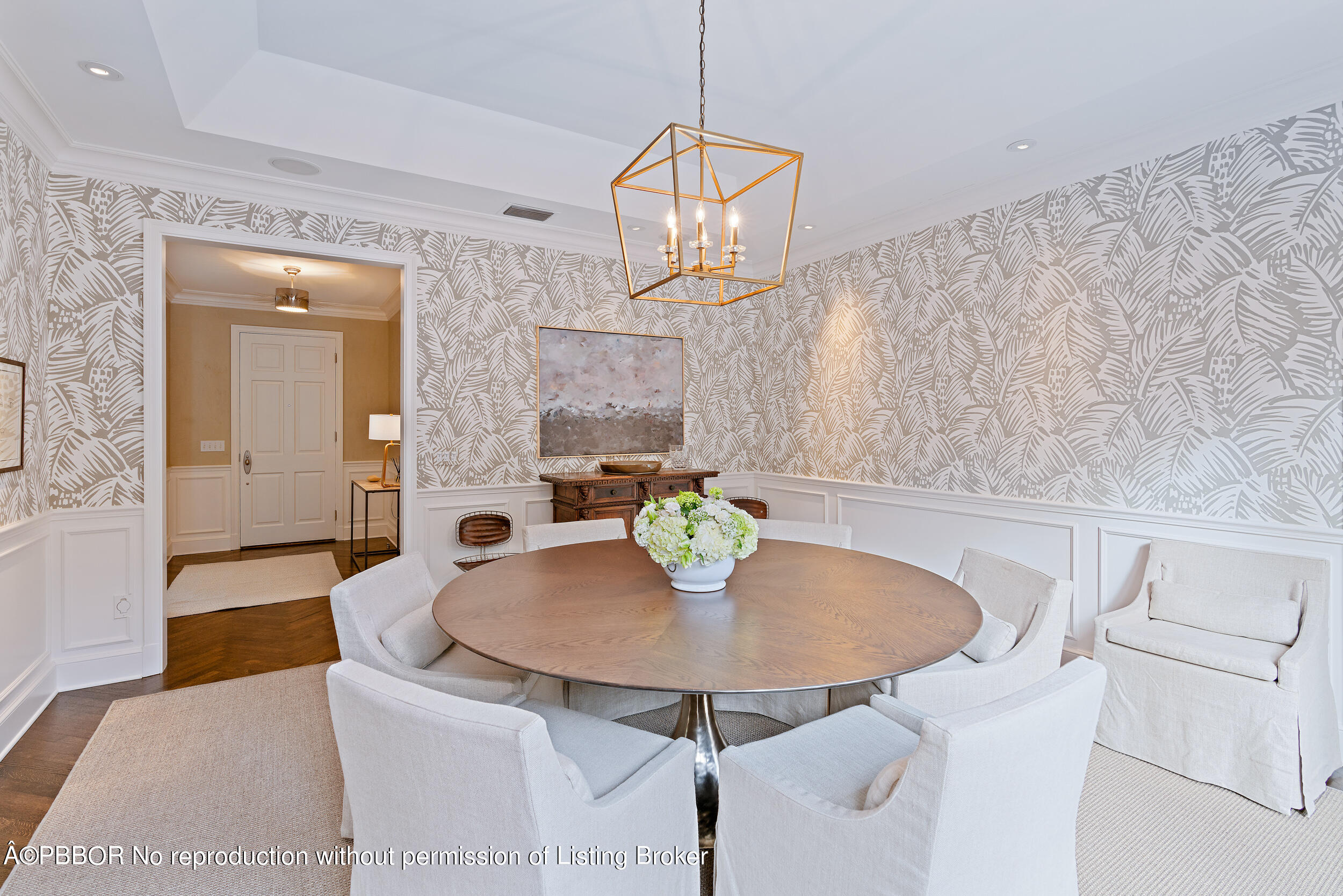 310 Plantation Road Palm Beach, FL 33480 - Photo 11 of 38 a dining room with table and chairs