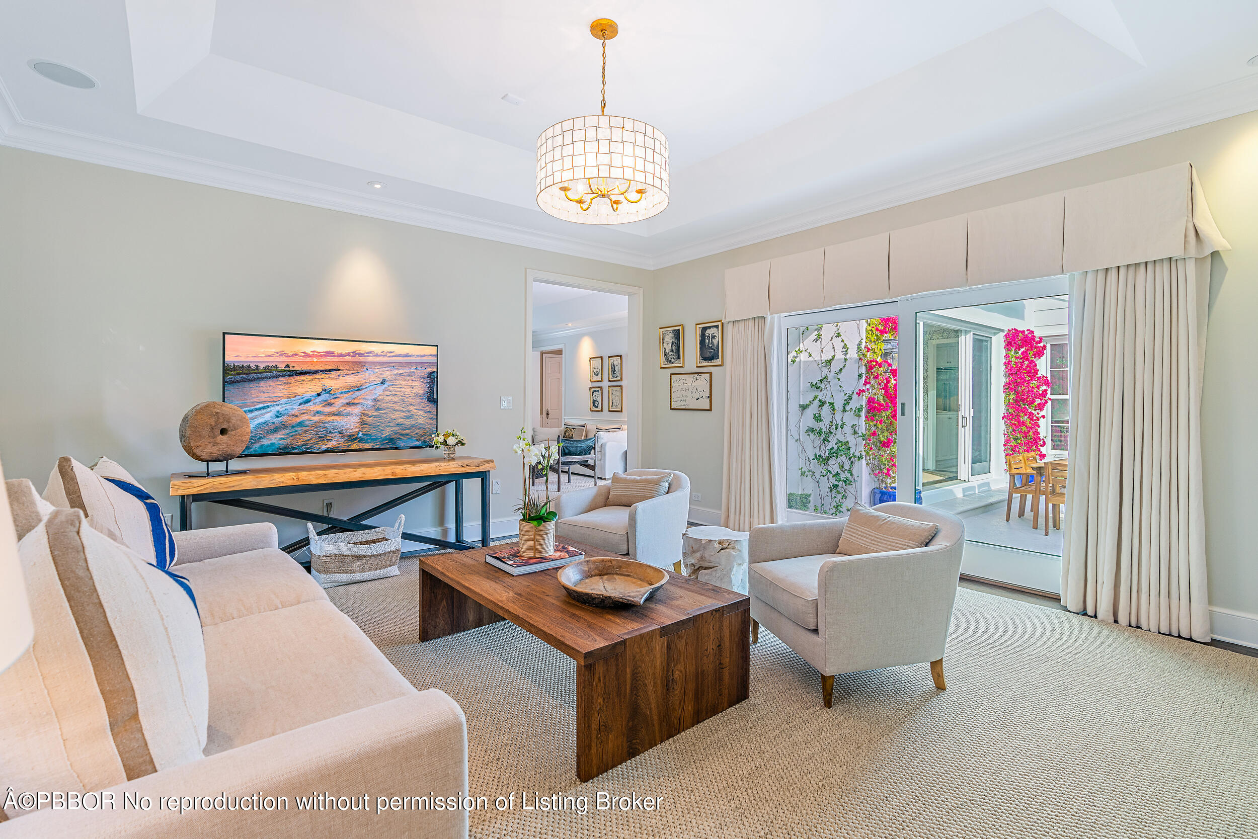 310 Plantation Road Palm Beach, FL 33480 - Photo 17 of 38 a living room with furniture a rug and a window