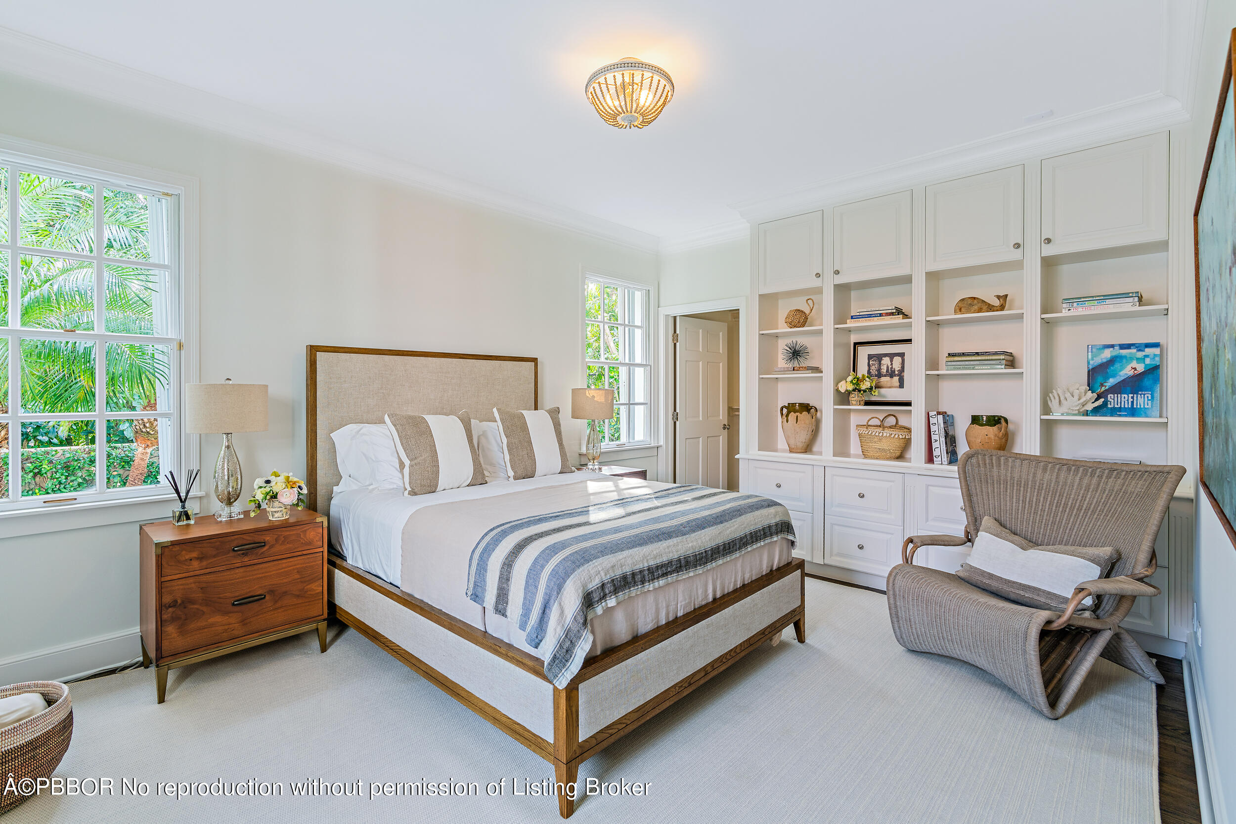 310 Plantation Road Palm Beach, FL 33480 - Photo 19 of 38 a spacious bedroom with a bed and a window