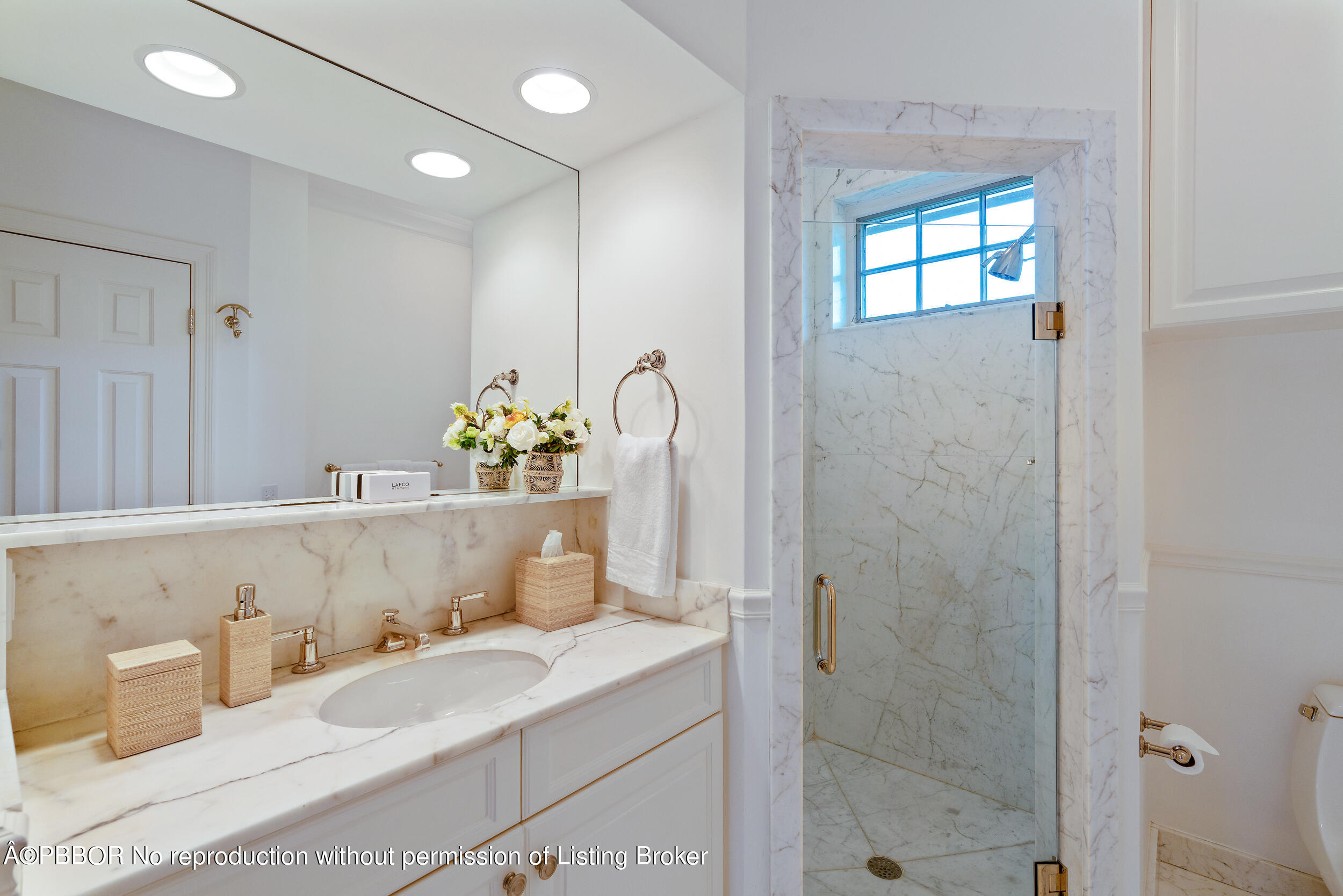 310 Plantation Road Palm Beach, FL 33480 - Photo 26 of 38 a bathroom with a granite countertop sink a toilet and shower