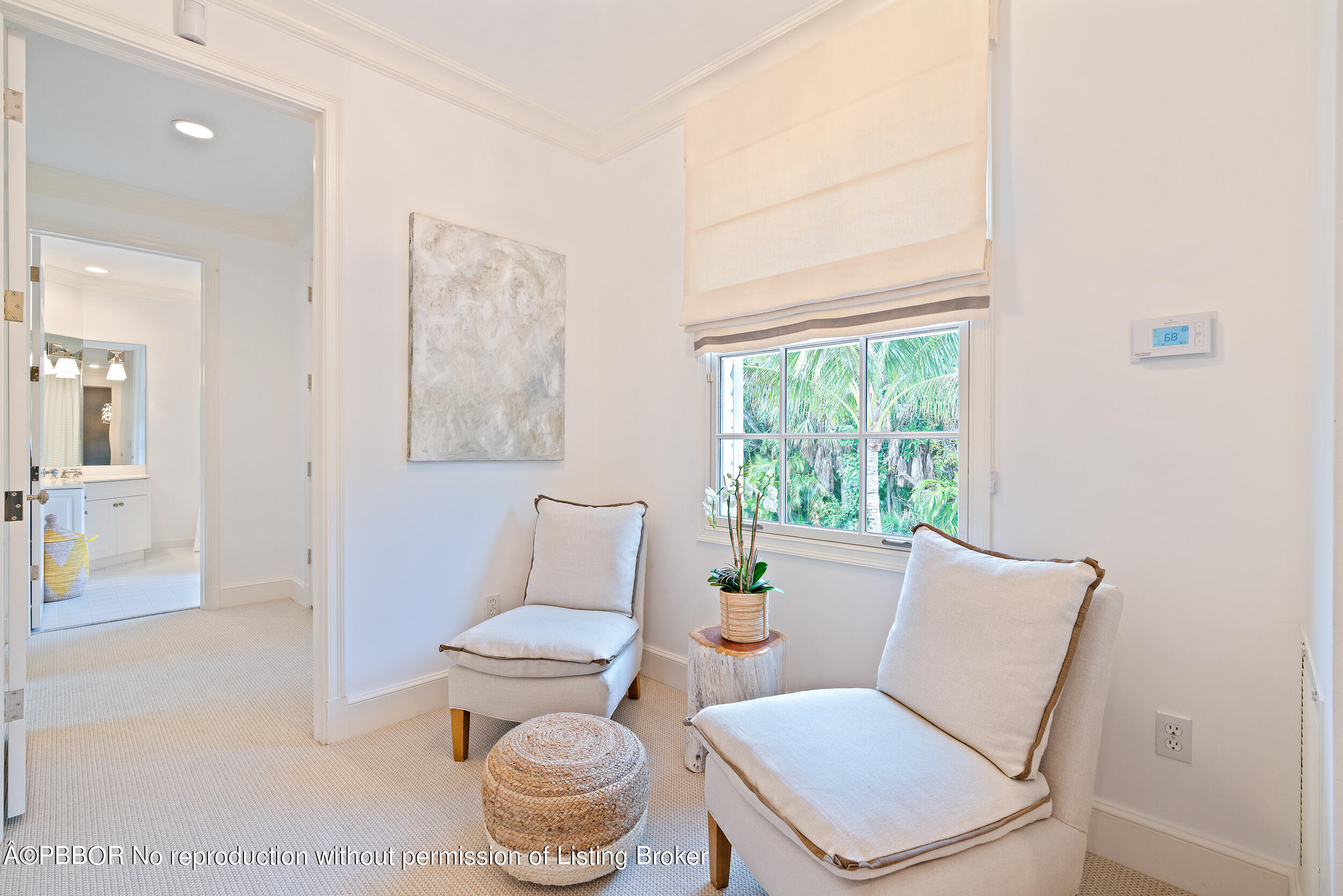 310 Plantation Road Palm Beach, FL 33480 - Photo 31 of 38 a white toilet sitting next to a window