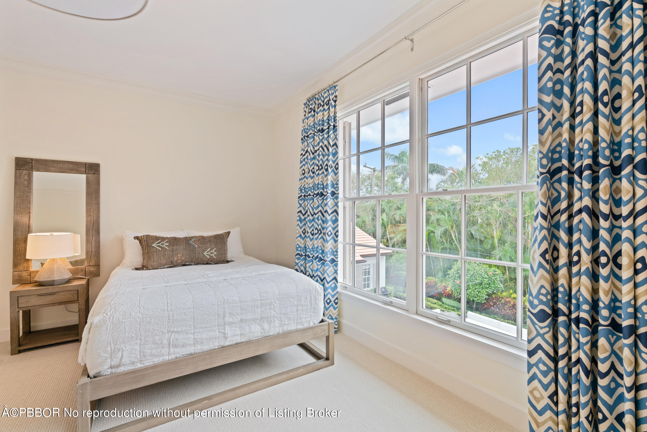310 Plantation Road Palm Beach, FL 33480 - Photo 32 of 38 a bedroom with a large bed and a window