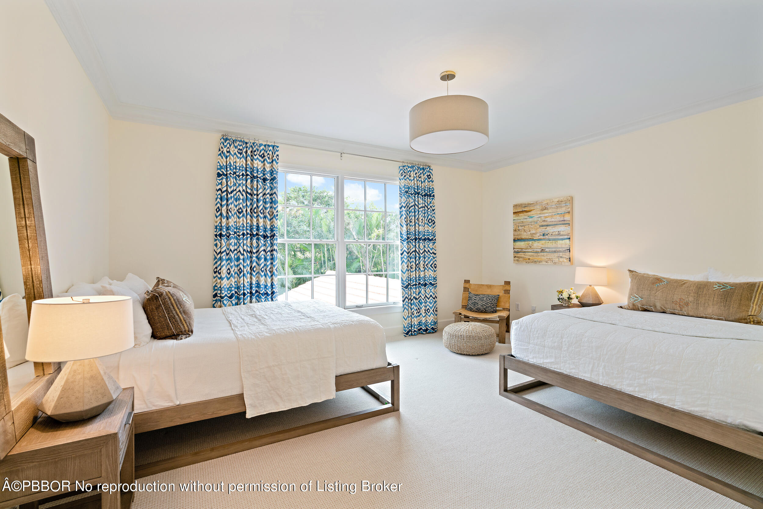 310 Plantation Road Palm Beach, FL 33480 - Photo 33 of 38 a bedroom with a bed and a chandelier