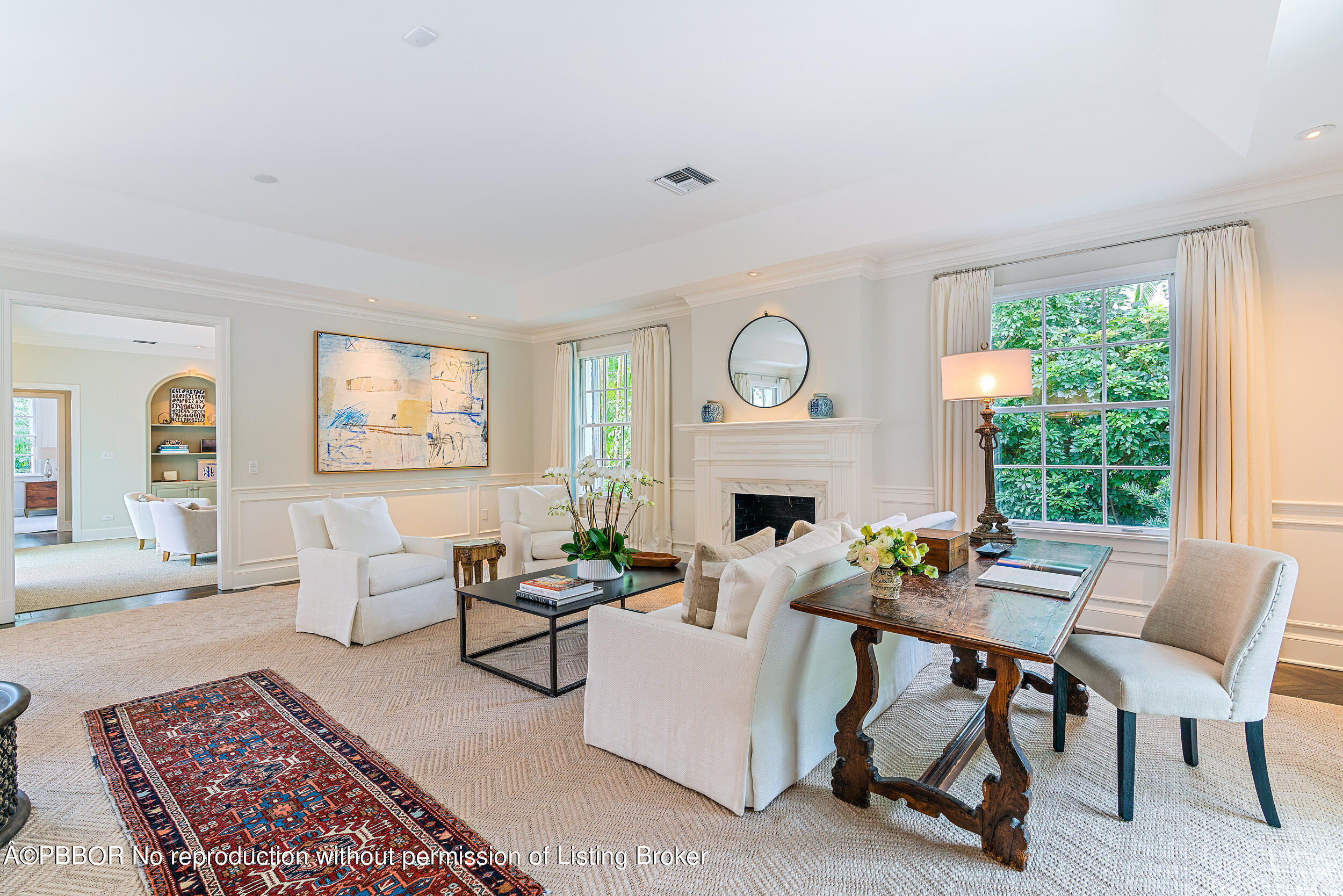 310 Plantation Road Palm Beach, FL 33480 - Photo 7 of 38 a living room with furniture a fireplace and a large window